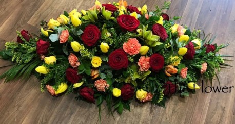 Red, Yellow and Orange Casket Spray