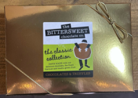 Box of 12 Artisan Truffles by Bittersweet Chocolates - Contains a selection of 12 of our delicious handmade fresh cream truffles.