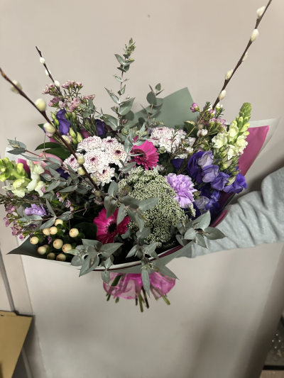 The Spring Muse - Soft lilacs, vibrant pinks and seasonal blooms, styled with eucalyptus and pussy willow for an airy, modern spring finish.