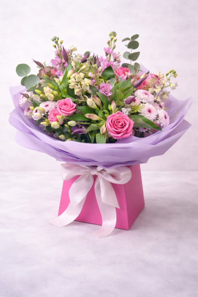 Pink Petal No. 13 - A soft, vibrant bouquet in pink, lilac and fresh green tones, designed with a romantic garden feel.