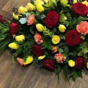 Red, Yellow and Orange Casket Spray